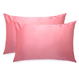 Pair of Silk Works 100% mulberry silk pillowcases in watermelon pink, shown on a white background.