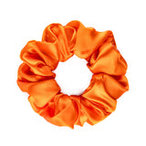 Silk Works large orange mulberry silk scrunchie with a smooth, lustrous finish for gentle hair styling.