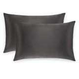 Pair of Silk Works 100% mulberry silk pillowcases in charcoal grey, shown on a white background.