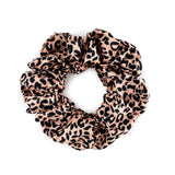 Silk Works large rose gold leopard mulberry silk scrunchie with a smooth, lustrous finish for gentle hair styling.