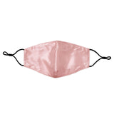 Silk Works pink mulberry silk face mask with black adjustable ear loops, designed for breathable, skin-friendly protection.