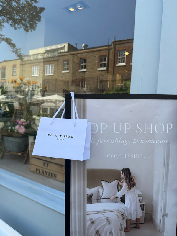 Silk Works branded bag on display outside the Chelsea pop-up shop 