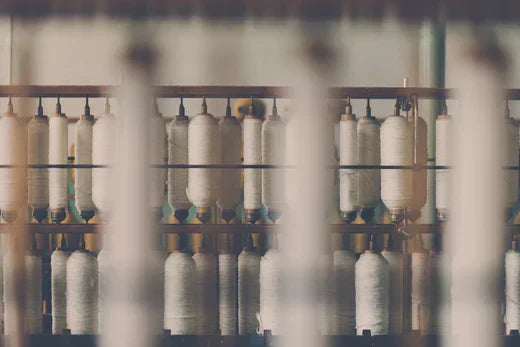 Silk being woven inside a silk factory