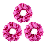 Set of three large bright pink mulberry silk scrunchies. 