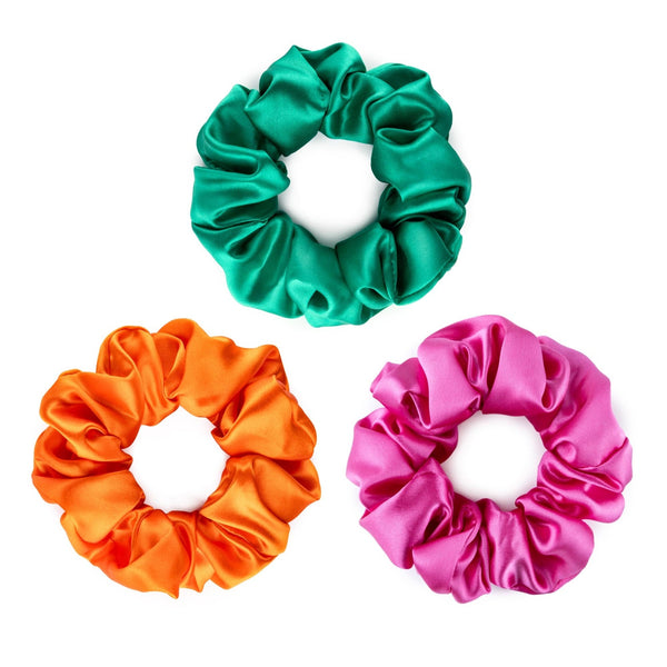 Bright pink, orange and green large silk scrunchies.