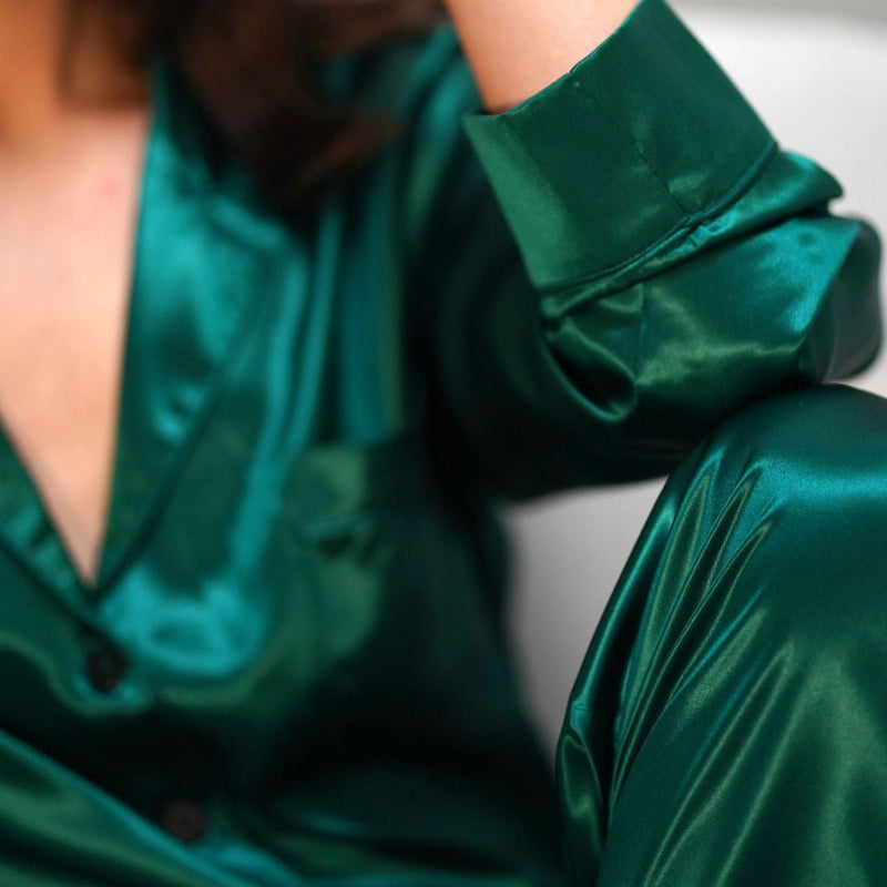 Lady wearing green mulberry silk pyjamas.