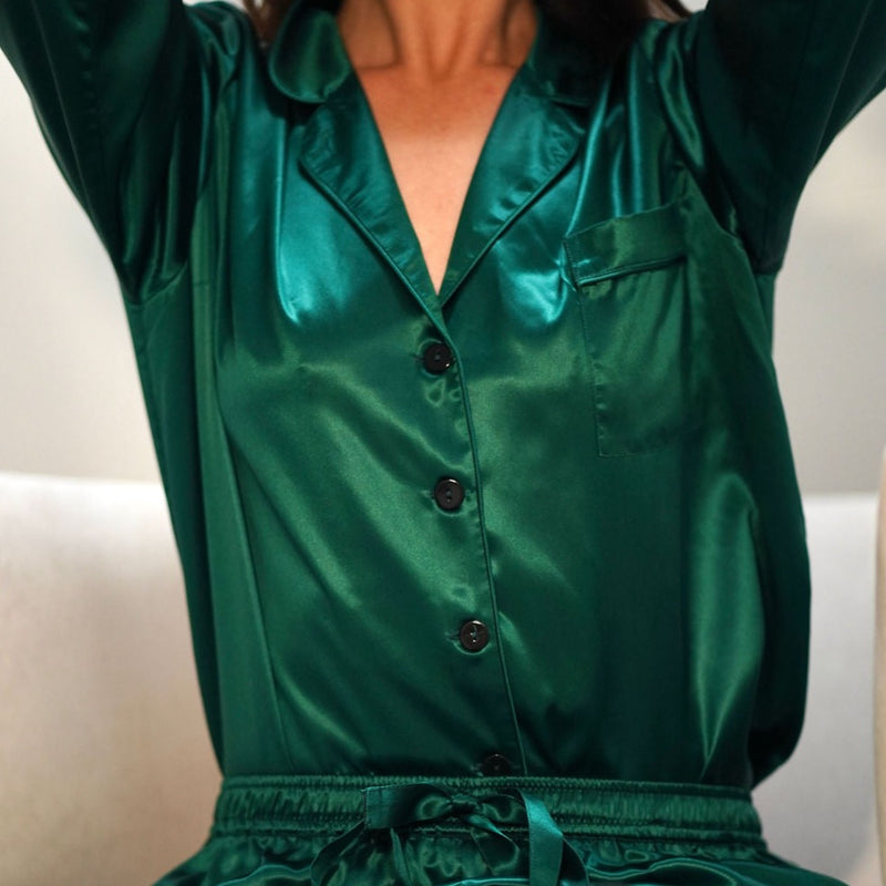 Lady wearing full length mulberry silk green silk pyjamas.