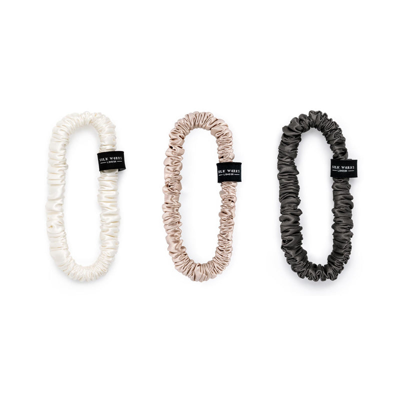 Three mulberry silk skinny scrunchies, white, caramel and grey colours