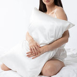 lady holding white mulberry silk pillowcase