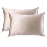Set of two mulberry silk pillowcases in a neutral caramel colour.